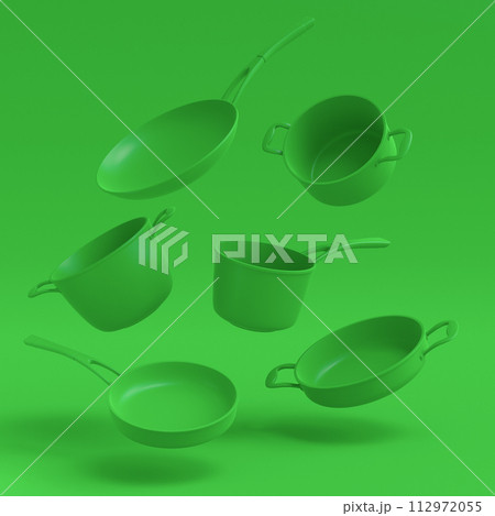 Set of flying stewpot, frying pan and plated cookware on monochrome background Set of flying stewpot, frying pan and plated cookware on monochrome background 112972055
