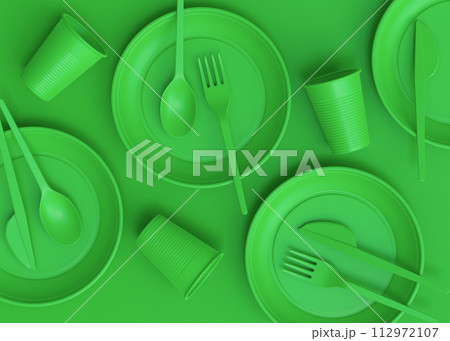 Set of disposable utensils like plate, folk, spoon,knife, cup and pepper mill 112972107