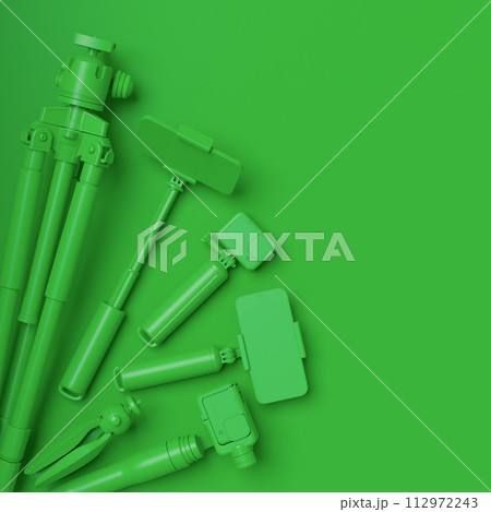 Top view of designer workspace and photography gear on monochrome table 112972243