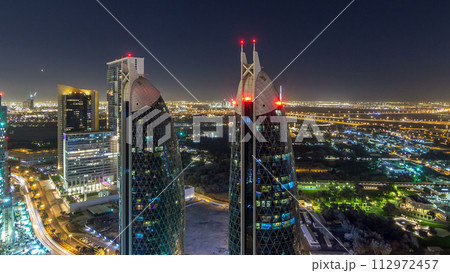 Skyline view of the buildings of Sheikh Zayed Road and DIFC night timelapse in Dubai, UAE. 112972457