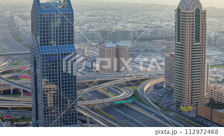 Traffic on a busy intersection on Sheikh Zayed highway aerial timelapse 112972468