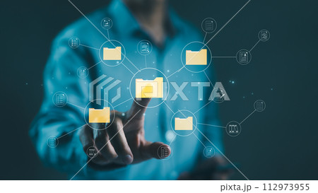 (DMS) Document management system concept. Businessman touching large folder to manage document files in folders. file storage on cloud. share database online, software for archiving and company data. 112973955