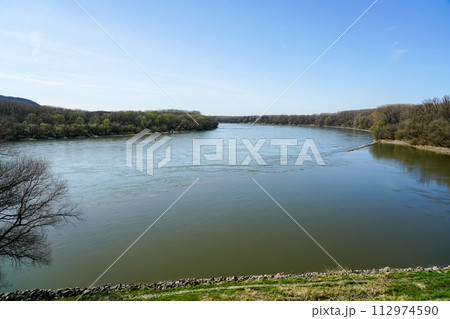 The mouth of the Morava river in the Danube near the Devin castle, springtime, Bratislava, Slovakia The mouth of the Morava river in the Danube near the Devin castle, springtime, Bratislava, Slovakia 112974590