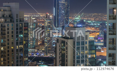 Dubai downtown night aerial timelapse Dubai downtown night aerial timelapse 112974676