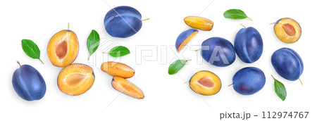 fresh blue plum and half with leaves isolated on white background. Top view. Flat lay 112974767