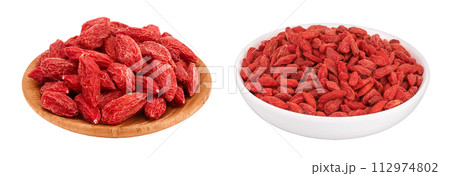 Dried goji berries in wooden bowl isolated on white background with full depth of field Dried goji berries in wooden bowl isolated on white background with full depth of field 112974802