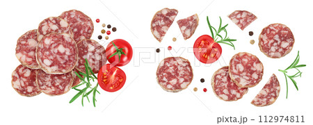 Cured salami sausage slices isolated on white background. Italian cuisine with full depth of field. Top view. Flat lay. 112974811