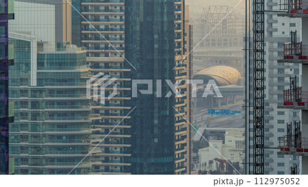 Amazing colorful dubai marina skyline during sunset timelapse 112975052