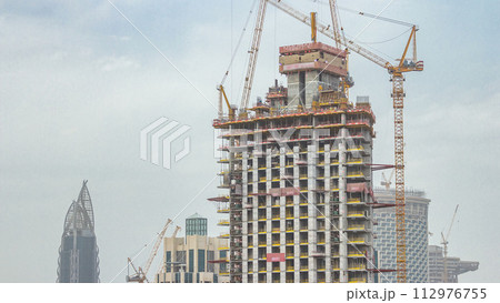 Construction site in Dubai timelapse, United Arab Emirates 112976755