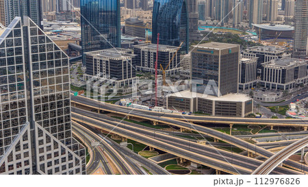 Dubai Downtown timelapse top view before sunset as shot from a rooftop viewpoint. Dubai, UAE 112976826