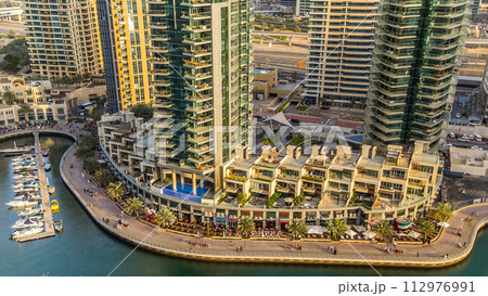 Aerial view timelapse of Dubai Marina at day time in Dubai, UAE 112976991