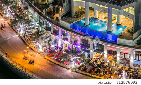 Aerial top view at night timelapse of Dubai Marina in Dubai, UAE 112976992