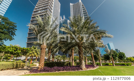 Residential buildings in Jumeirah Lake Towers timelapse in Dubai, UAE. Residential buildings in Jumeirah Lake Towers timelapse in Dubai, UAE. 112977006