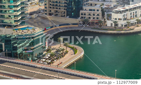 Aerial view timelapse of Dubai Marina at day time in Dubai, UAE 112977009