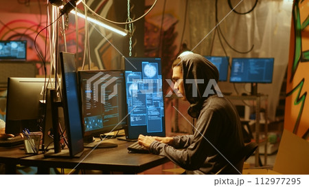Hackers found by cybercriminal law enforcement able to get past their usage of anonymity tools to mask online identity. Criminals in hideout running from police after hacking into servers 112977295