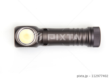 flashlight on a white background. item for camping and household life. 112977402