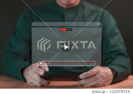 Fans football using a computer laptop for watching live football or soccer streaming online on virtual screen, searching video on internet, concept of sport content online.. Fans football using a computer laptop for watching live football or soccer streaming online on virtual screen, searching video on internet, concept of sport content online.. 112979554