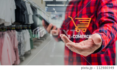 Businessman or customer hold smartphone with online shopping concept, marketplace website with virtual interface of online Shopping cart part of the e-commerce marketing network. Businessman or customer hold smartphone with online shopping concept, marketplace website with virtual interface of online Shopping cart part of the e-commerce marketing network. 112980349
