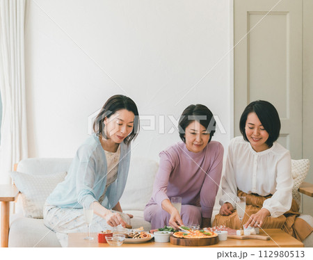 a forty-something woman a forty-something woman 112980513
