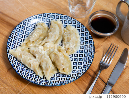 Japanese gyoza dumplings served on platter Japanese gyoza dumplings served on platter 112980690