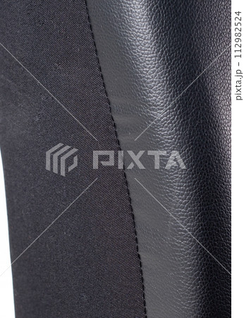 Black eco leather cover for car seat on isolated white background 112982524