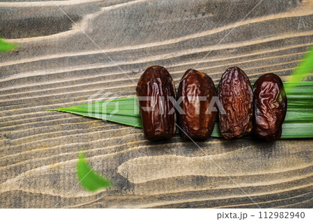 Dried dates fruit for iftar on Ramadan Dried dates fruit for iftar on Ramadan 112982940