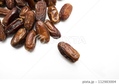 Image of tasty dried dates fruits isolated on white background. Image of tasty dried dates fruits isolated on white background. 112983004