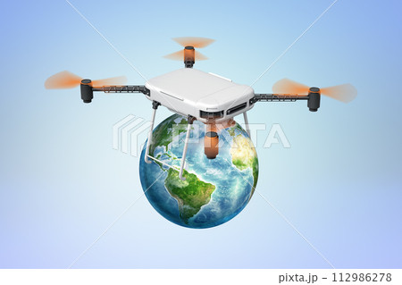 Drone flying above a small globe Drone flying above a small globe 112986278