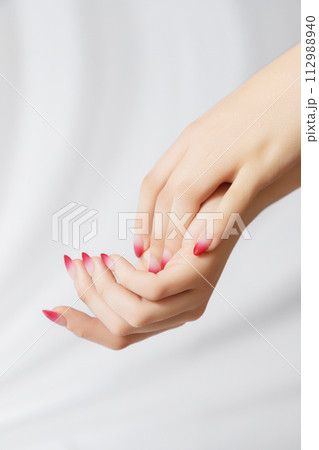 Beautiful Woman Hands. Female Hands Applying Cream Beautiful Woman Hands. Female Hands Applying Cream 112988940