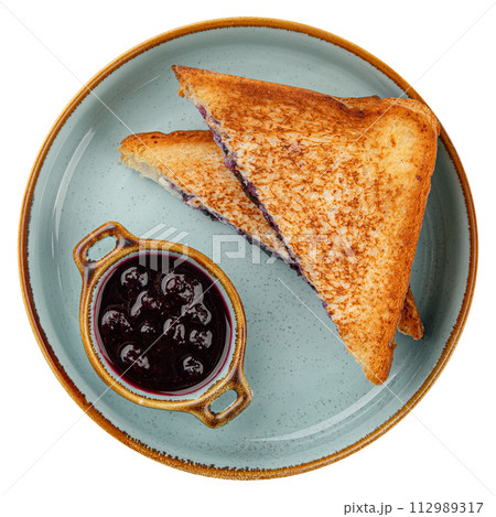 Portion of sweet sandwich with berry jam 112989317