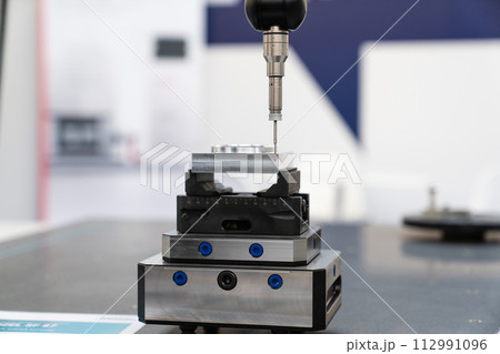 Infrared sensor for measuring parts. Quality evaluation on a modern factory.. Infrared sensor for measuring parts. Quality evaluation on a modern factory.. 112991096