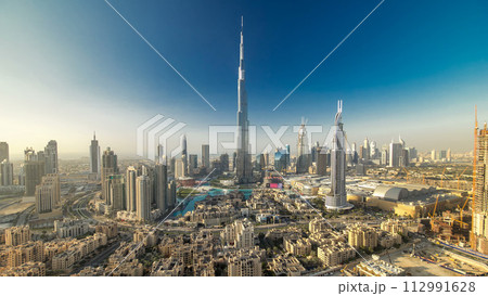 Dubai Downtown at evening timelapse view from the top in Dubai, United Arab Emirates 112991628