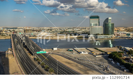 Business bay crossing bridge timelapse, 13-lane-bridge, over the Dubai Creek Business bay crossing bridge timelapse, 13-lane-bridge, over the Dubai Creek 112991714