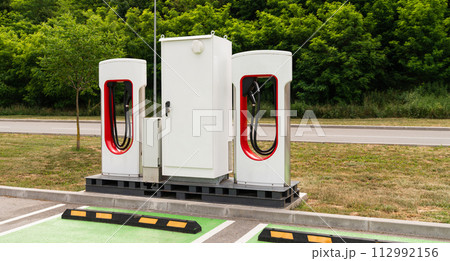 Electric car charging station on a street 112992156