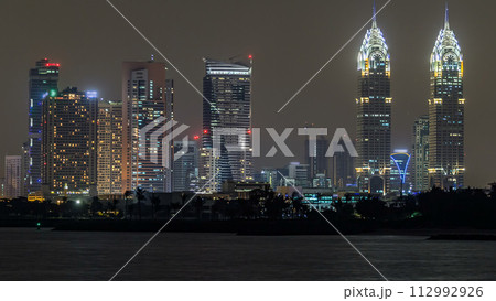 Dubai Internet City district panorama with towers timelapse. 112992926