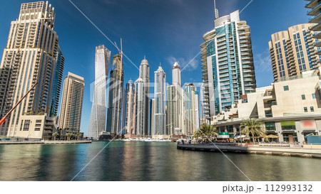 Dubai Marina towers in Dubai at day time timelapse hyperlapse Dubai Marina towers in Dubai at day time timelapse hyperlapse 112993132