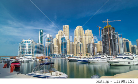 Dubai Marina towers in Dubai at day time timelapse hyperlapse Dubai Marina towers in Dubai at day time timelapse hyperlapse 112993153