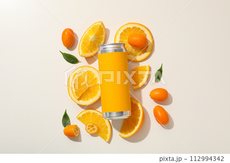 Tin can and oranges on white background, top view 112994342