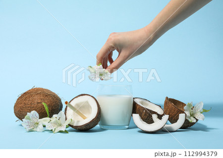 Coconut milk, concept of tasty and natural drink Coconut milk, concept of tasty and natural drink 112994379