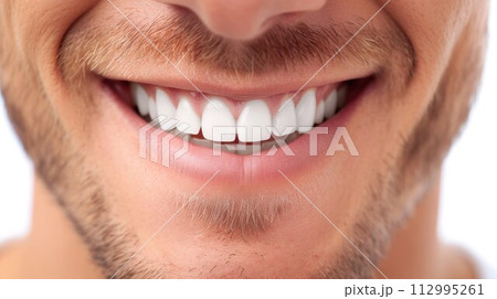 Detailed image of young man smiling with perfect white teeth 112995261