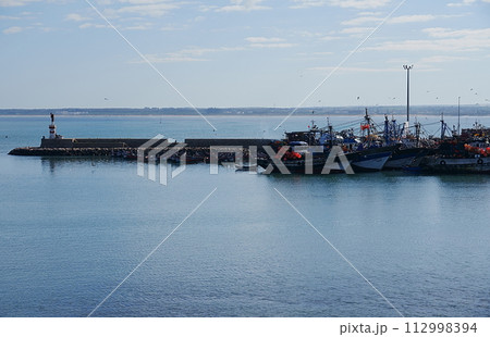 Harbor for fishing boats in African MAZAGAN city in Morocco Harbor for fishing boats in African MAZAGAN city in Morocco 112998394