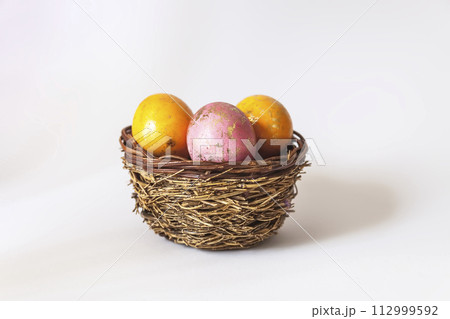 Colored eggs. Traditional Easter food and decoration. 112999592