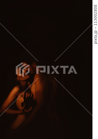 Sexy naked nude couple hugging, kissing and photographing of selfie on camera in reflection of mirror. Young beautiful girl woman photographer and attractive man. Motion blur Sexy naked nude couple hugging, kissing and photographing of selfie on camera in reflection of mirror. Young beautiful girl woman photographer and attractive man. Motion blur 113002808