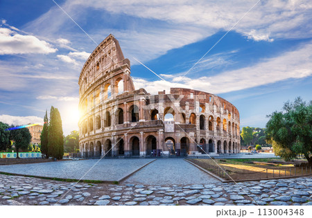 Roman Coliseum at sunrise, the main summer view with no people, Italy Roman Coliseum at sunrise, the main summer view with no people, Italy 113004348
