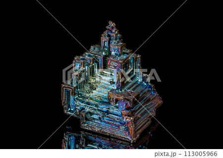 Macro of the stone bismuth mineral on a black background 113005966