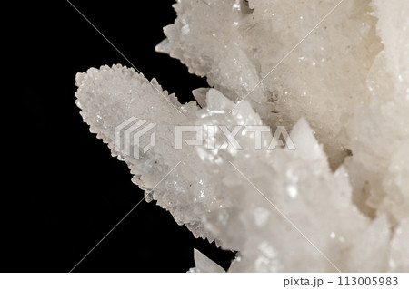 Macro stone Calcite mineral on a black background 113005983