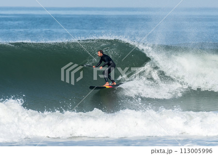 Stand up paddle surfer Stand up paddle surfer 113005996