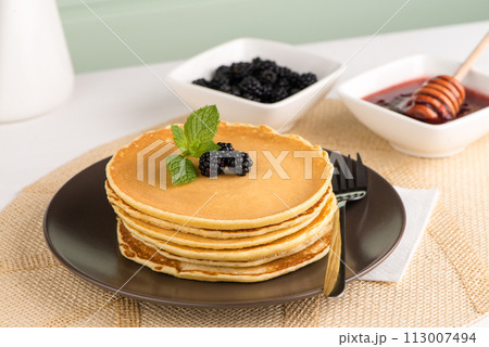 Pancakes with fresh blackberries 113007494