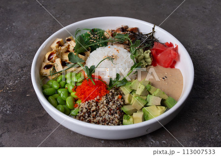 Delightful Poke Bowl with Fresh Ingredients and Vibrant Colors Delightful Poke Bowl with Fresh Ingredients and Vibrant Colors 113007533