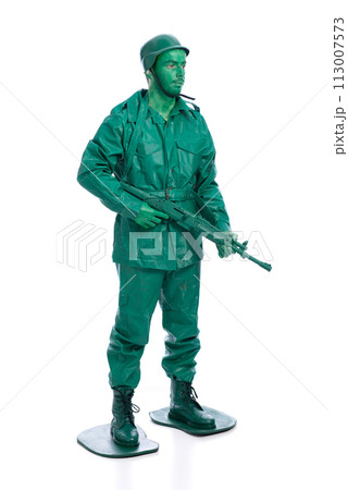 Man on a green toy soldier costume 113007573